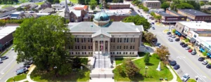 Aerial view of the Limestone County Courthouse and surrounding downtown square in Athens, Alabama.