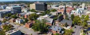 Aerial view of downtown Huntsville, Alabama, with historic churches, homes, and office buildings.
